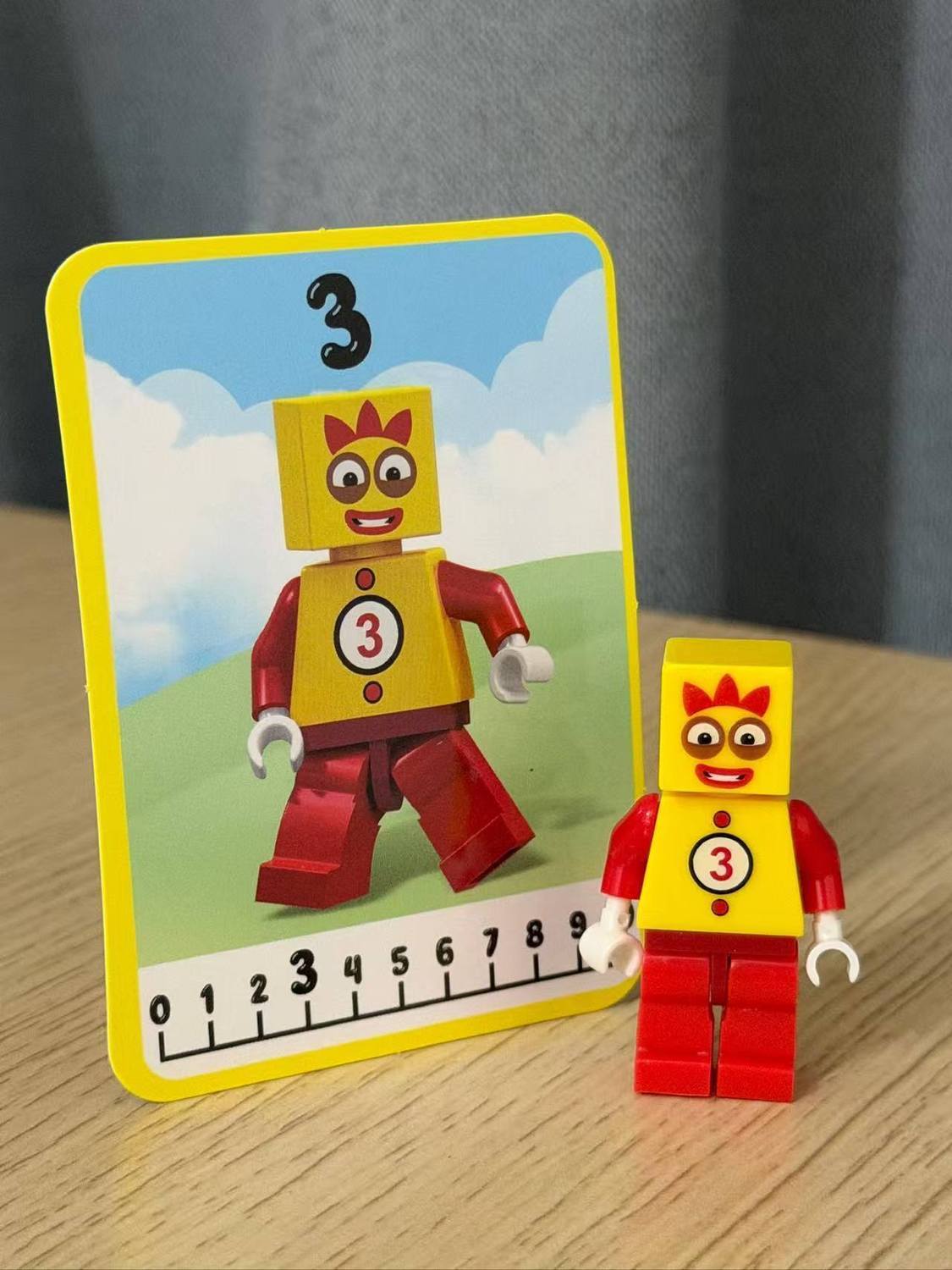 Numberblocks building blocks toy set featuring a 3 figure and matching card for educational play.