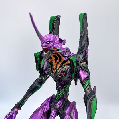 Evangelion Unit-01 figure displayed on a desk as anime room decor